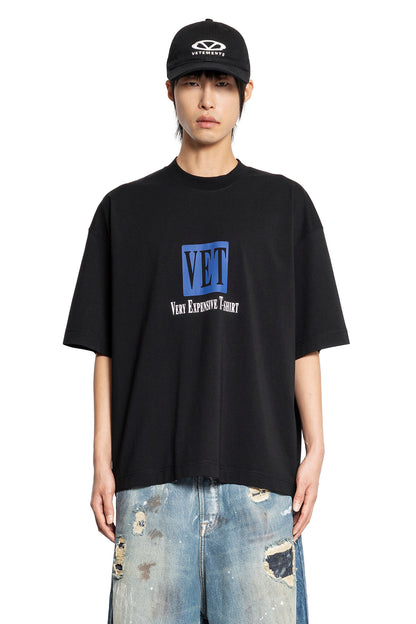 VETEMENTS MAN BLACK T-SHIRTS & TANK TOPS