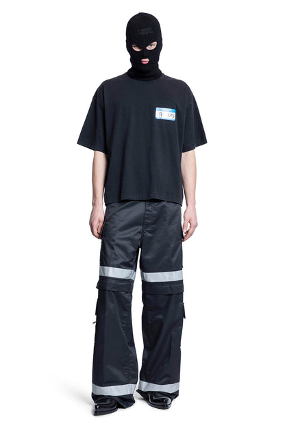 VETEMENTS MAN BLACK T-SHIRTS & TANK TOPS