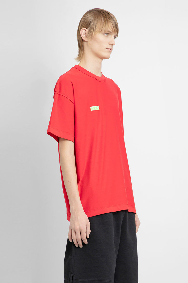 VETEMENTS MAN RED T-SHIRTS & TANK TOPS