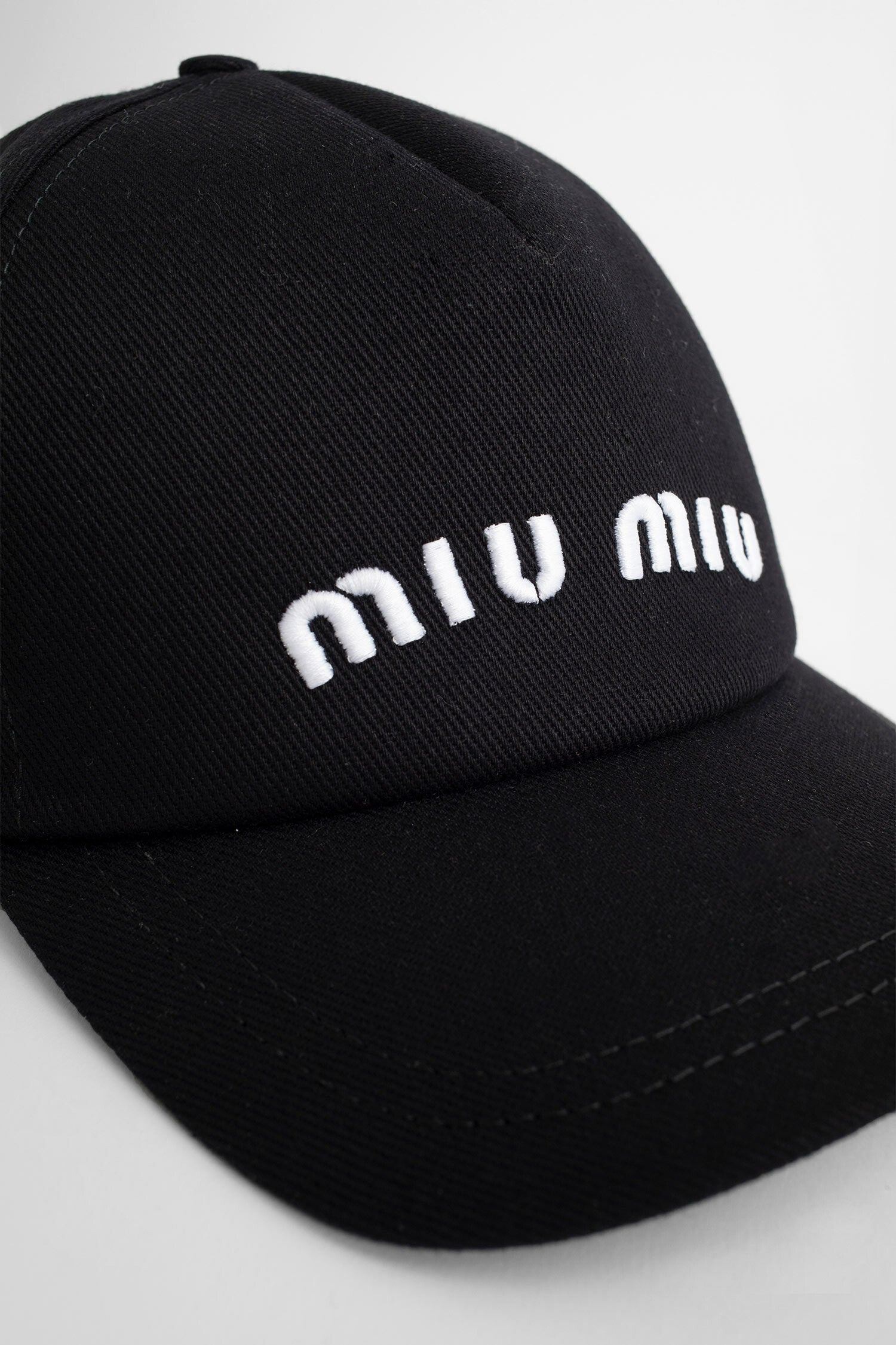 MIU MIU WOMAN BLACK HATS