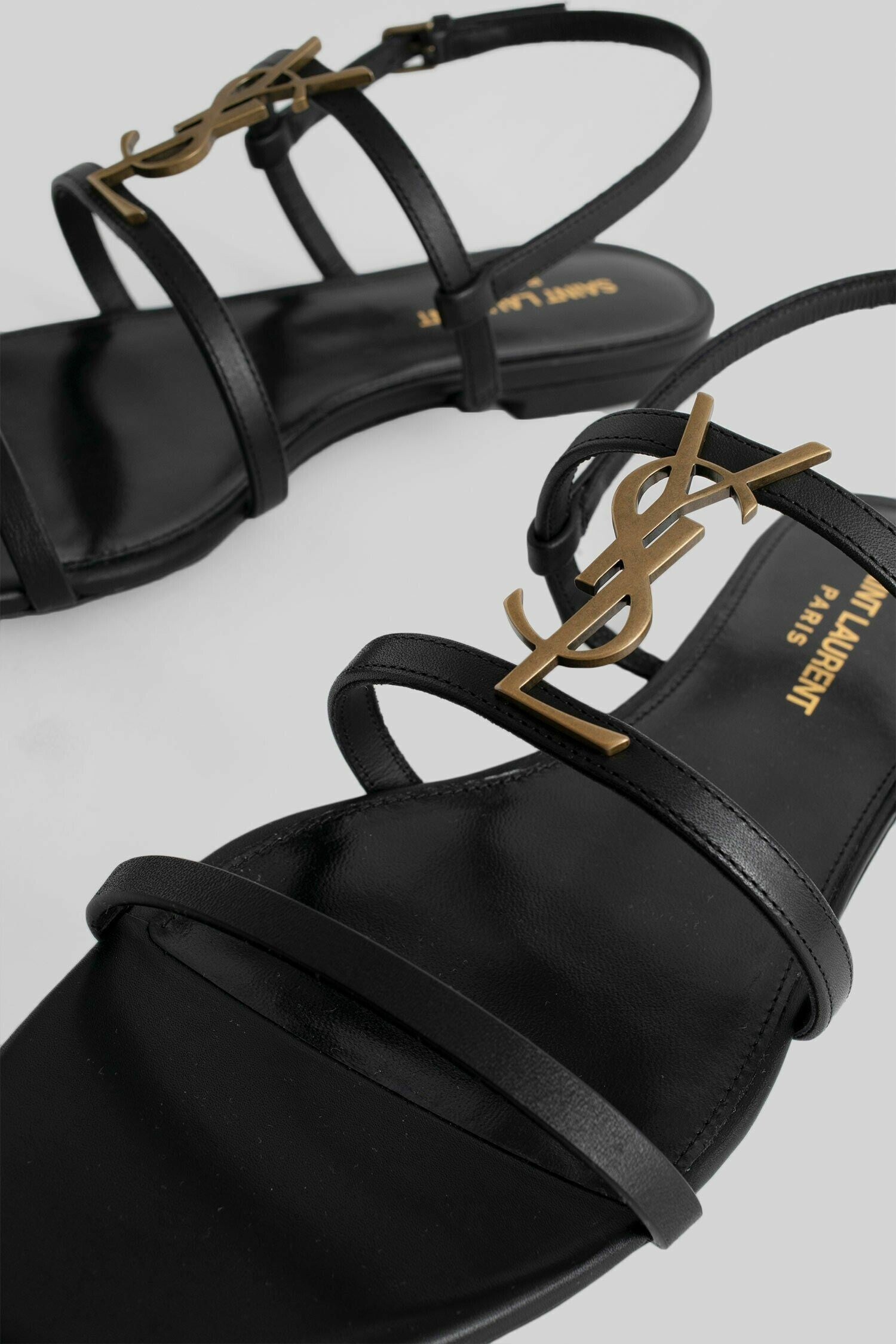 SAINT LAURENT WOMAN BLACK SANDALS & SLIDES