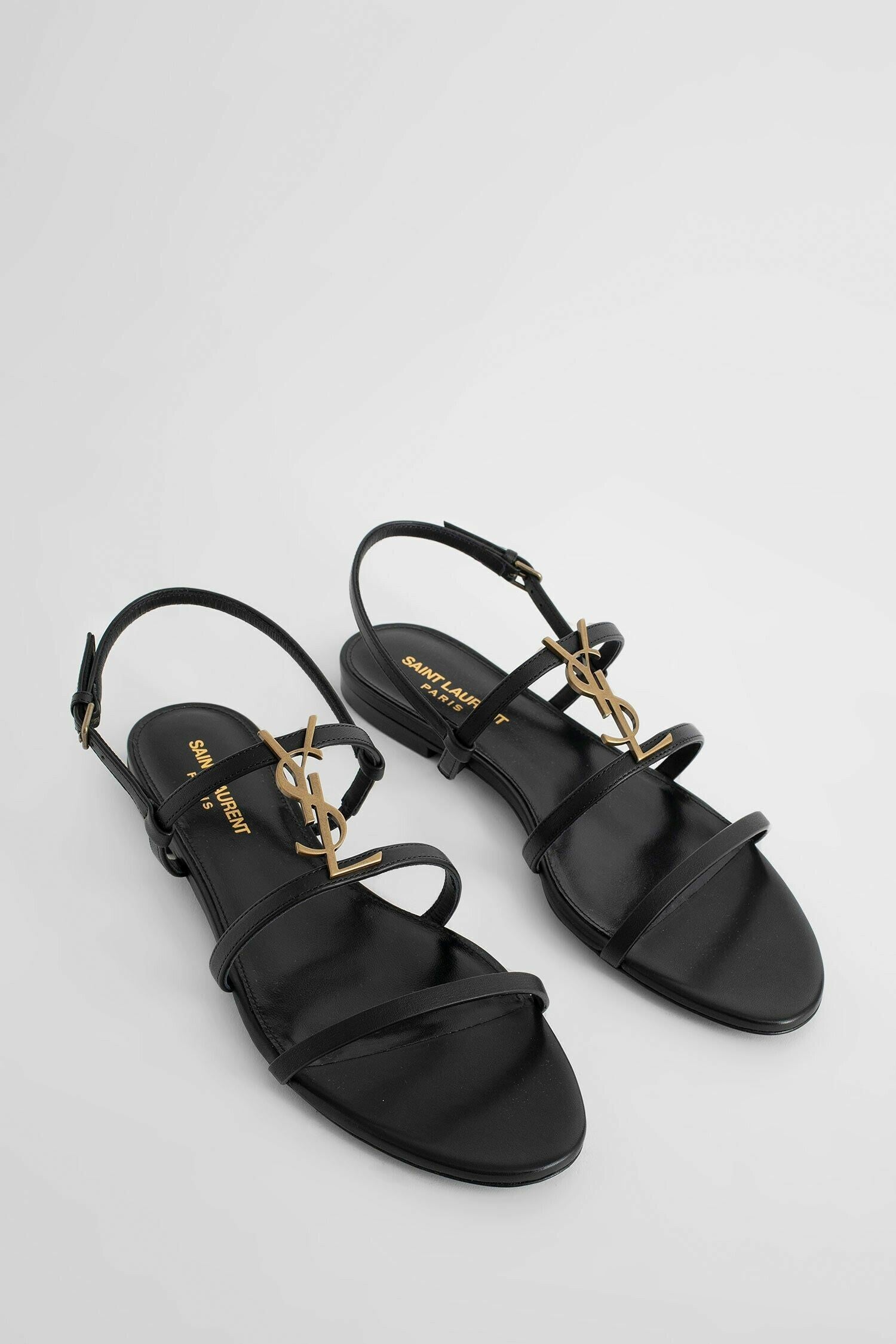 SAINT LAURENT WOMAN BLACK SANDALS & SLIDES