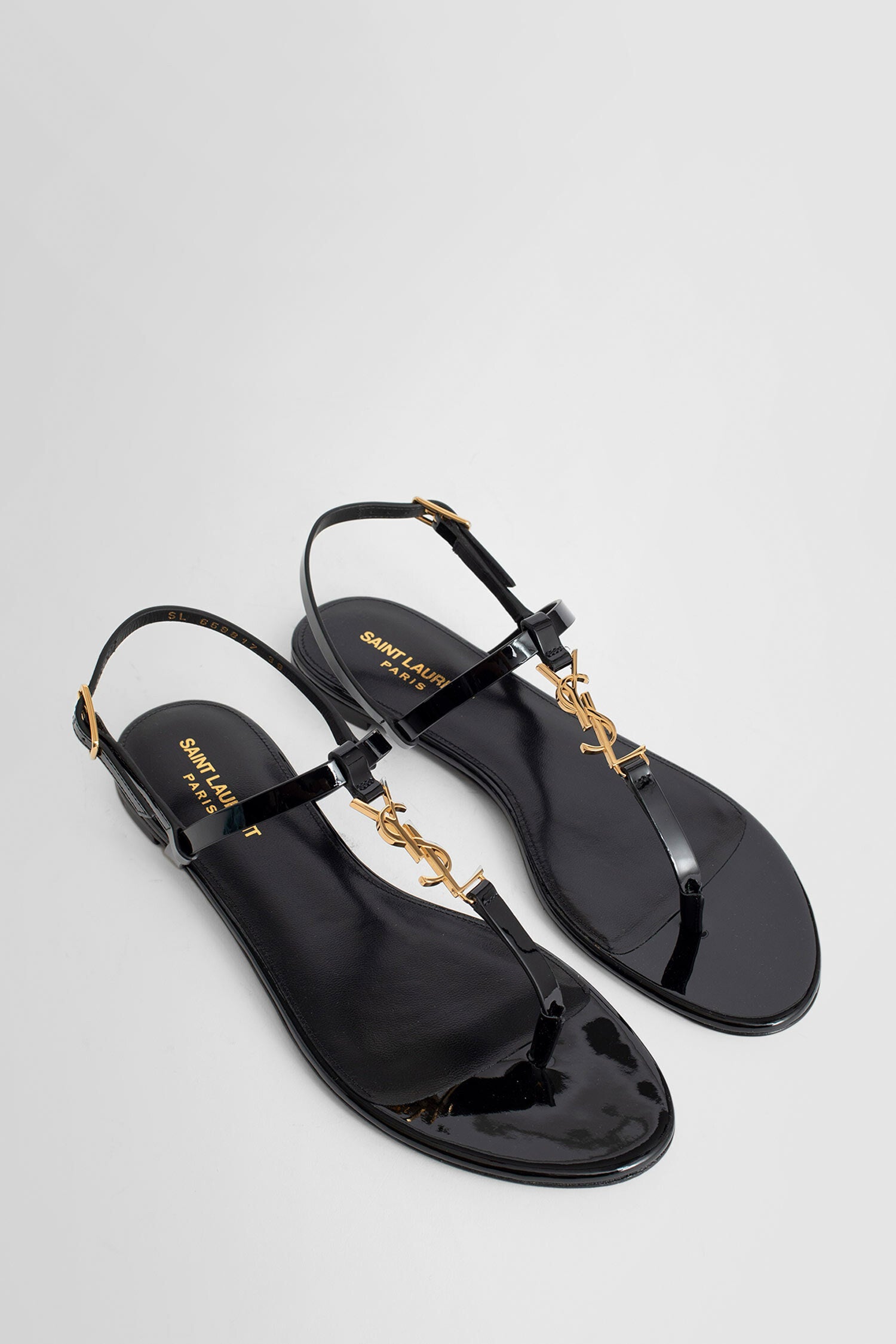 SAINT LAURENT WOMAN BLACK SANDALS & SLIDES