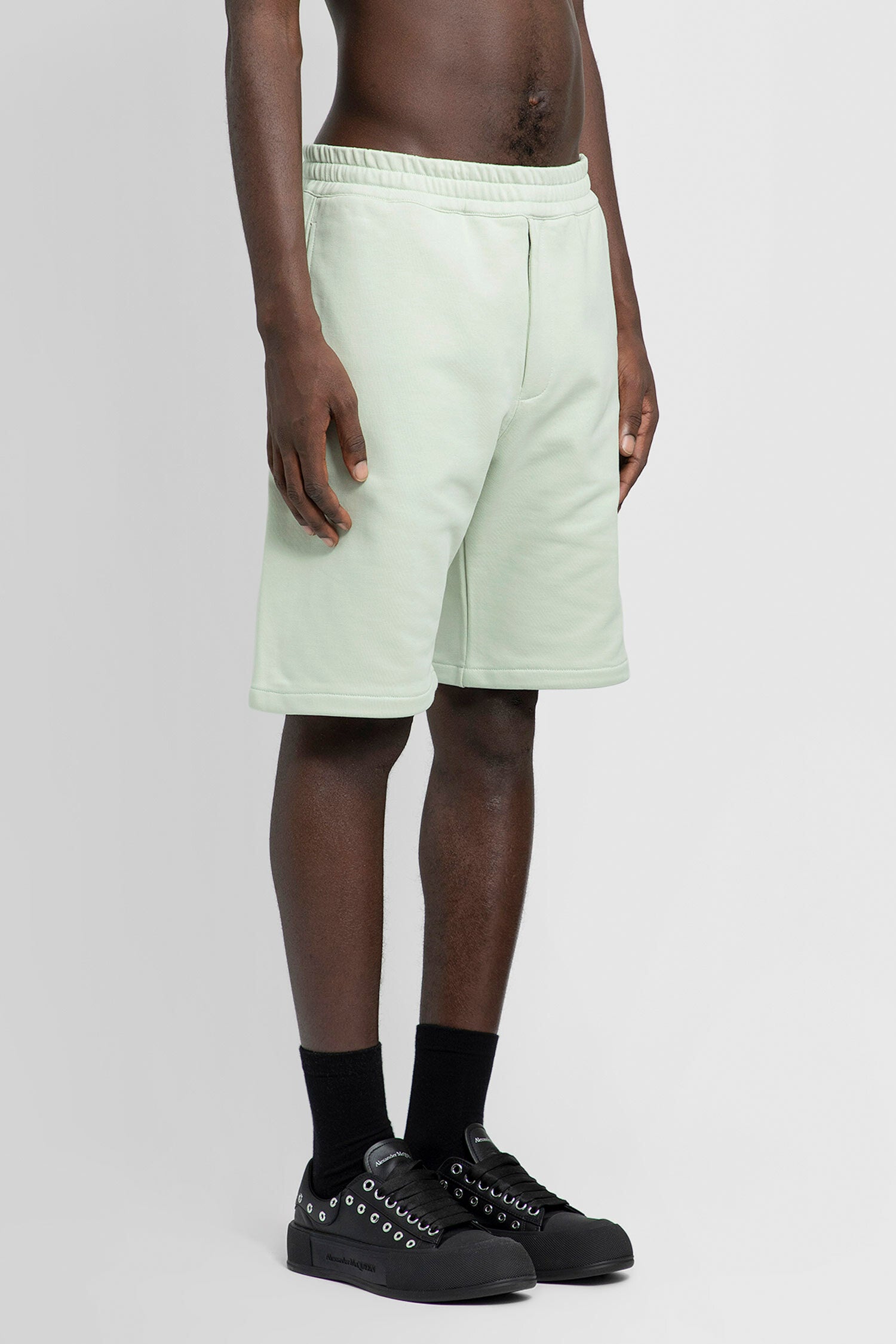 ALEXANDER MCQUEEN MAN GREEN SHORTS & SKIRTS