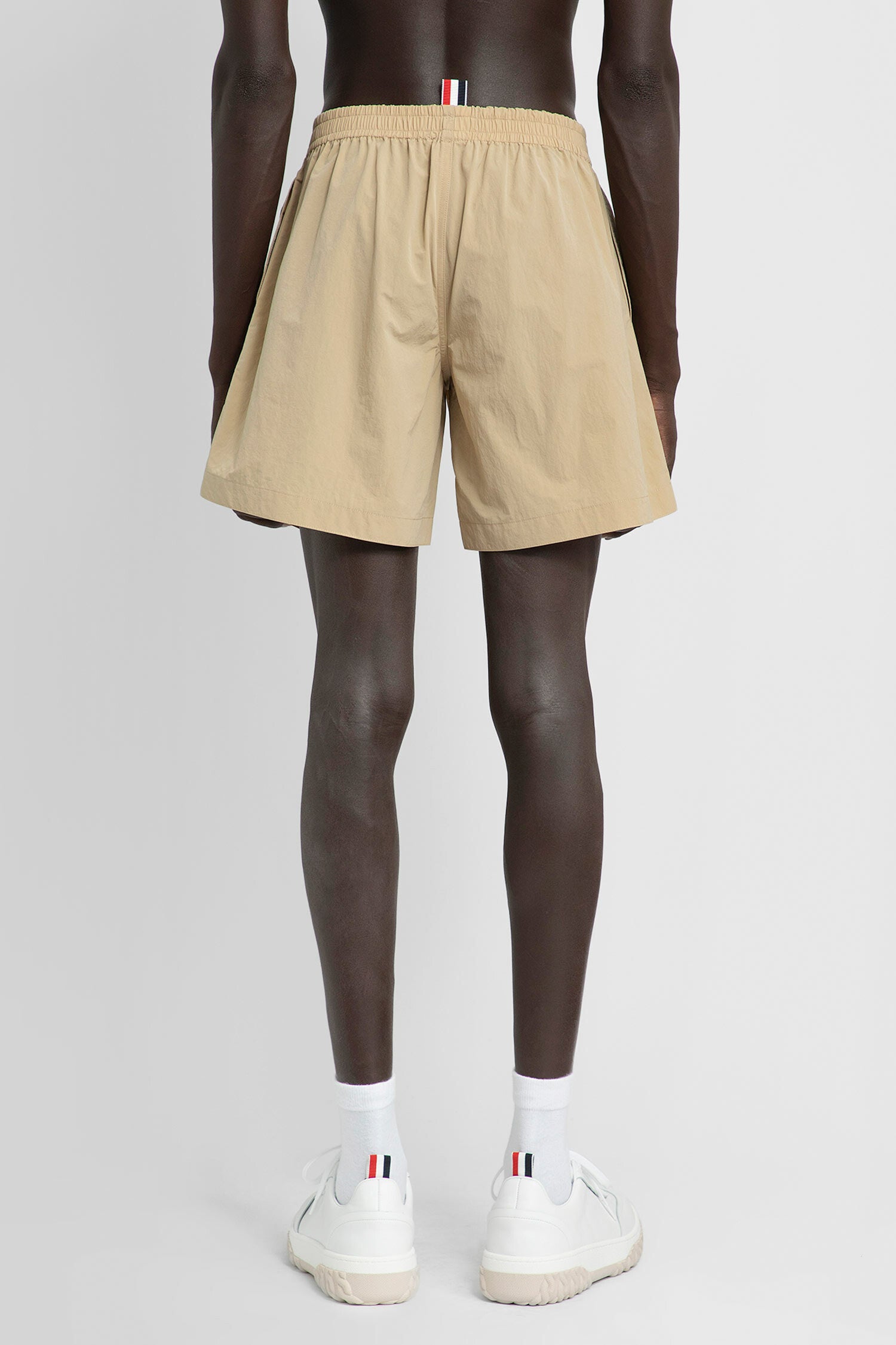 THOM BROWNE MAN BEIGE SHORTS & SKIRTS