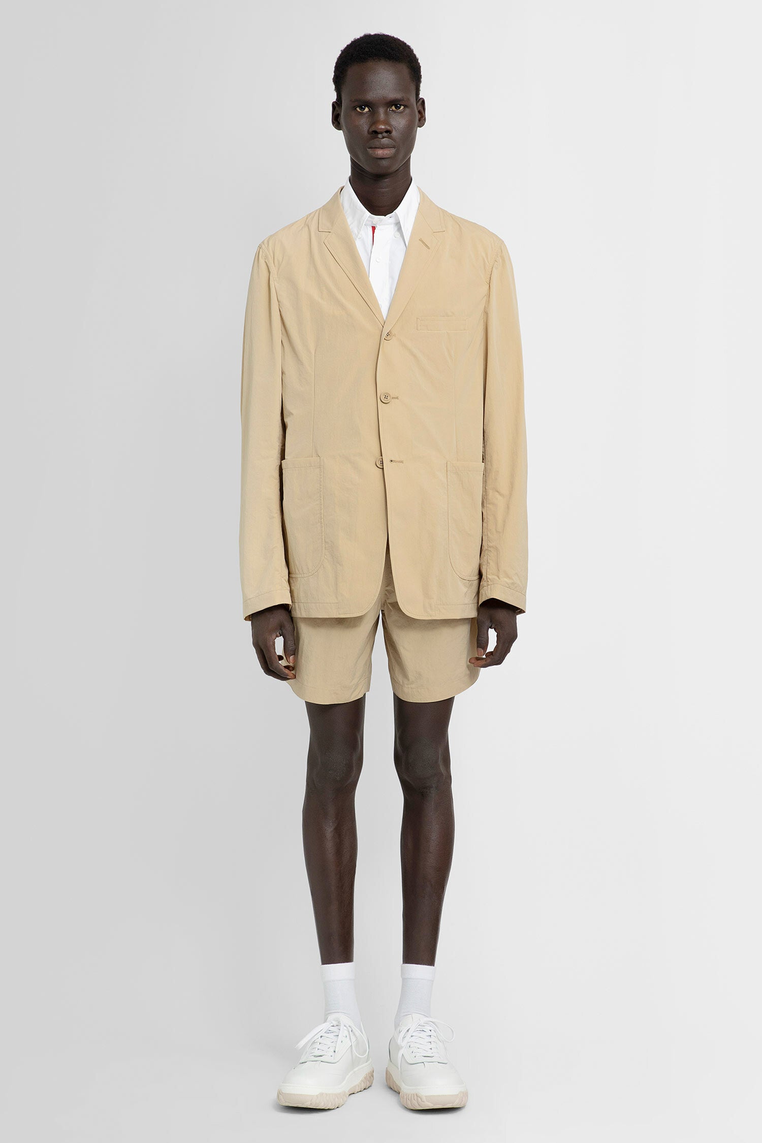 THOM BROWNE MAN BEIGE SHORTS & SKIRTS