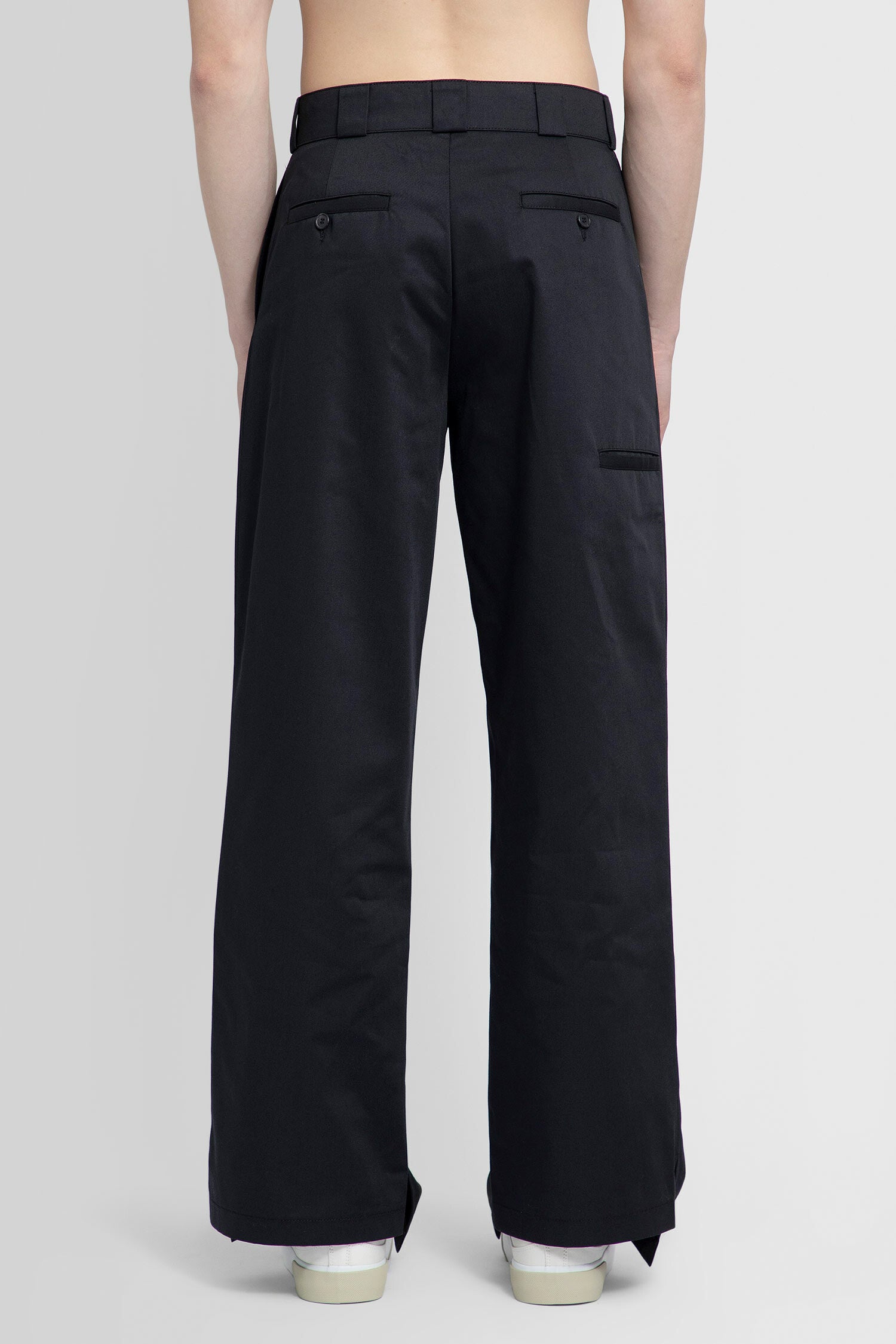 PALM ANGELS MAN BLACK TROUSERS